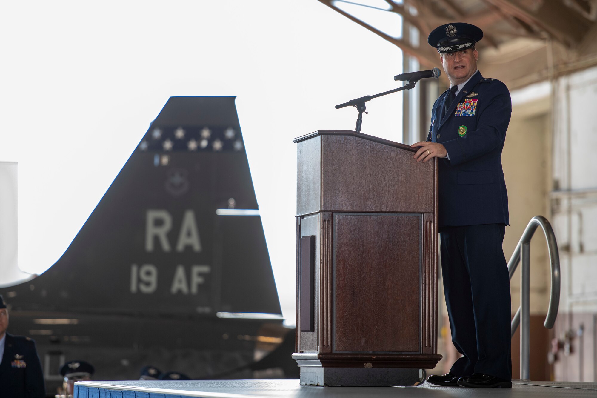 U.S. Air Force Maj. Gen. Phillip Stewart, 19th Air Force commander, speaks to the audience after receiving the unit guidon during the 19th Air Force change of command ceremony Aug. 19, 2022, at Joint Base San Antonio-Randolph, Texas. Stewart is responsible for monitoring production and oversees top level instruction and flying operations, manning, contracts, logistics and maintenance trends. (U.S. Air Force photo by Jonathan Mallard)