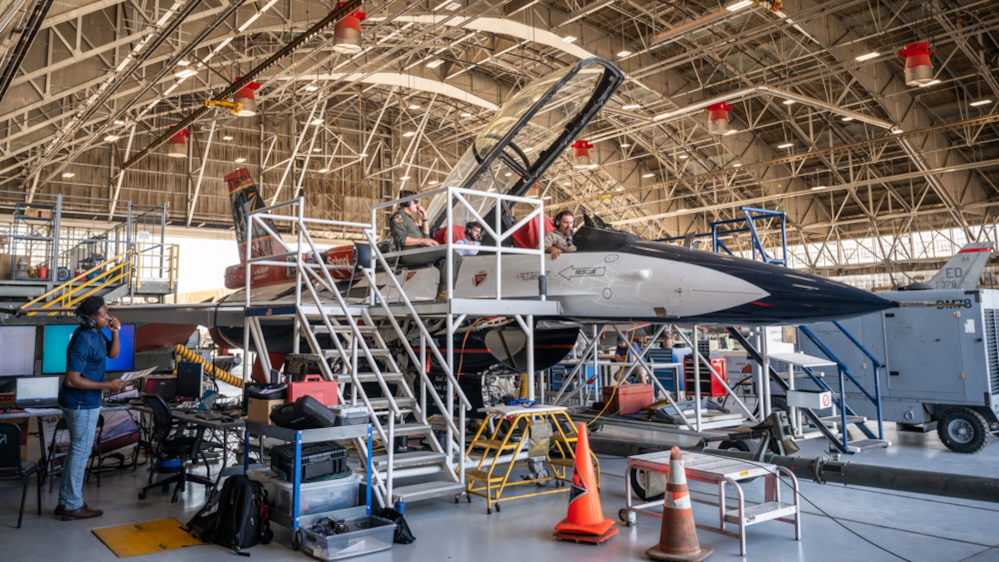 Crews from the U.S. Air Force Test Pilot School and Calspan work on the X-62, also known as the Variable In-flight Stability Test Aircraft, or VISTA, Aug. 3, at Edwards Air Force Base, California. (Air Force photo by Giancarlo Casem)