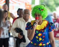 A Soldier plays a clown at organizational day 2022