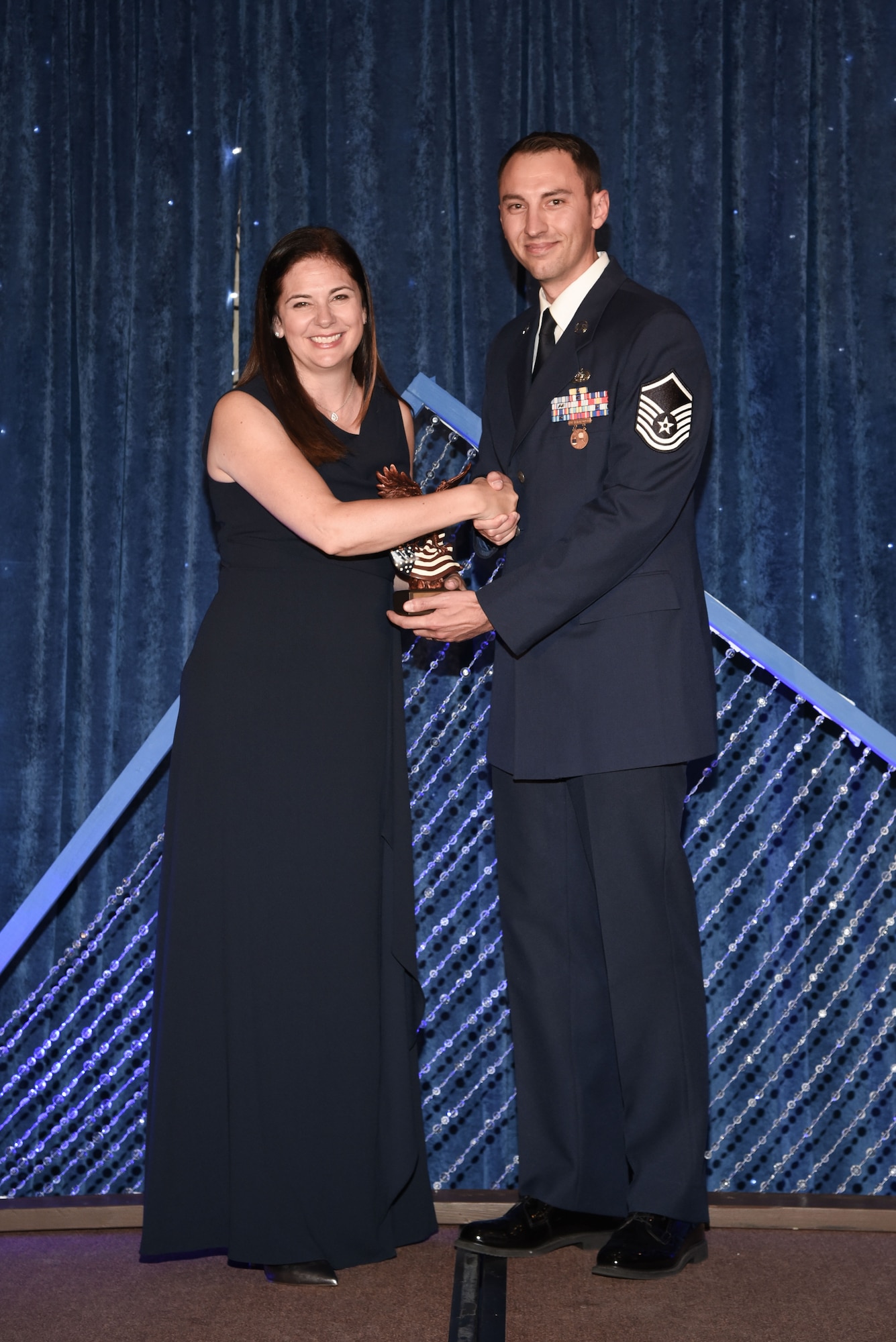 The Rocky Mountain Chapter of National Defense Industrial Association awarded the 2022 General James V. Hartinger Award and the Patriot Award to a Guardian and an Airman from Space Operations Command during the 39th Annual NDIA Ball at the Cheyenne Mountain Resort in Colorado Springs, Colorado, Aug. 19, 2022.