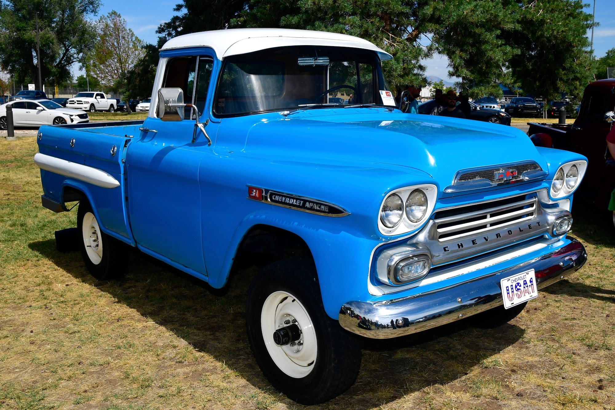A blue 1959 Chevy Apache 3100 Truck.