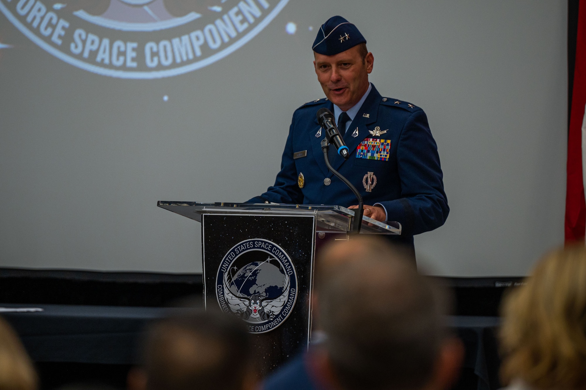 U.S. Space Force Maj. Gen. Douglas A. Schiess, newly appointed Combined Force Space Component Command commander, makes his first remarks as the unit’s commander during the CFSCC change of command ceremony at Vandenberg Space Force Base, Calif., Aug. 22, 2022. Prior to assuming command of CFSCC, Schiess was the Deputy Commanding General, Operations at Headquarters Space Operations Command at Peterson Space Force Base, Colo. (U.S. Space Force photo by Tech. Sgt. Luke Kitterman)