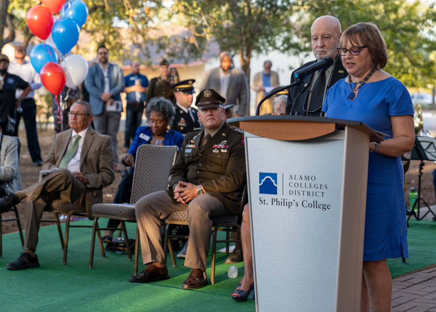 Nan Burley Richie, right, daughter of the late retired U.S. Army Col. Roy W. Burley, Sr., speaks with her brother, Roy W. Burley, Jr., left, during St. Philip’s College’s Col. Burley Oak Tree Dedication Ceremony, held on the St. Philip’s College campus, August 18, 2022. The 100-plus-year-old oak tree is part of the Burley homestead of the late retired U.S. Army Col. Roy W. Burley, Sr., for many generations. The tree now resides on the college campus with a plaque to share with future generations the legacy of “The Colonel”. (U.S. Army Photo by Bethany L. Huff)