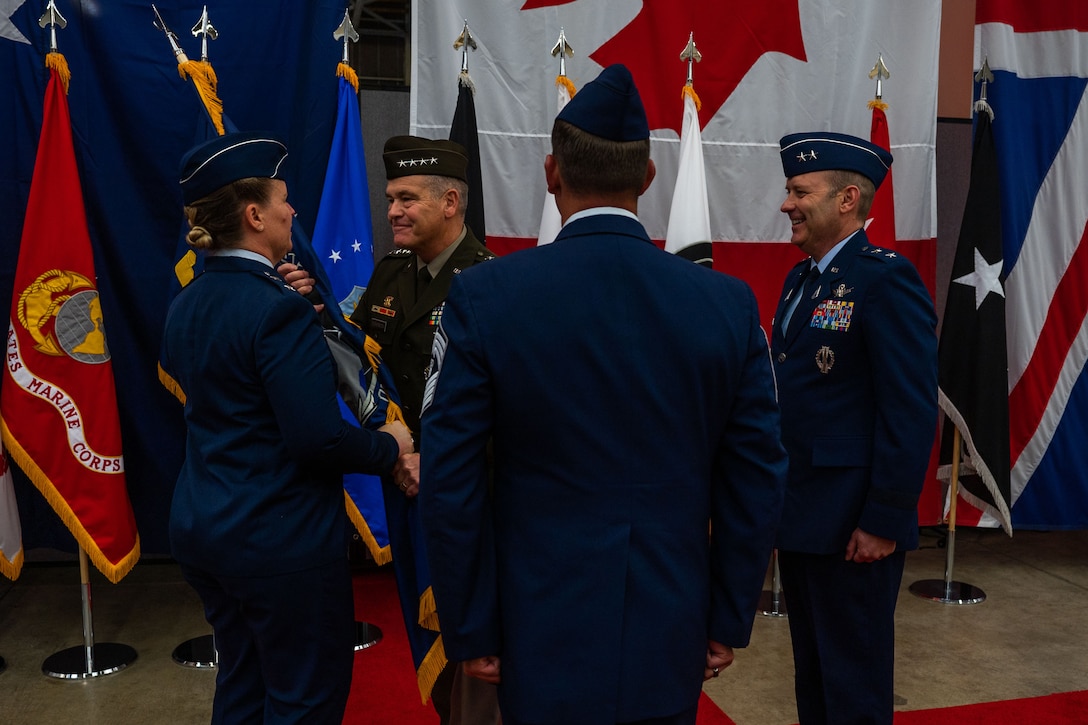 (From left to right) U.S. Space Force Maj. Gen. DeAnna M. Burt, outgoing Combined Force Space Component Command (CFSCC) commander, U.S. Army Gen. James H. Dickinson, U.S. Space Command commander, U.S. Space Force Chief Master Sgt. Grange S. Coffin IV, CFSCC SEL, and U.S. Space Force Maj. Gen. Douglas A. Schiess, incoming CFSCC commander, prepare to participate in the ceremonious passing of the guidon during the CFSCC change of command ceremony at Vandenberg Space Force Base, Calif., Aug. 22, 2022. The transfer of command is a tradition dating back to the 18th century, and symbolizes the continuity of command of the armed forces. (U.S. Space Force photo by Tech. Sgt. Luke Kitterman)