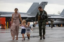 U.S. Navy Lt. Van Den Berg, an F/A-18 Super Hornet pilot assigned to Carrier Air Wing 5, reunites with his family after returning to Marine Corps Air Station Iwakuni, August 17, 2022.