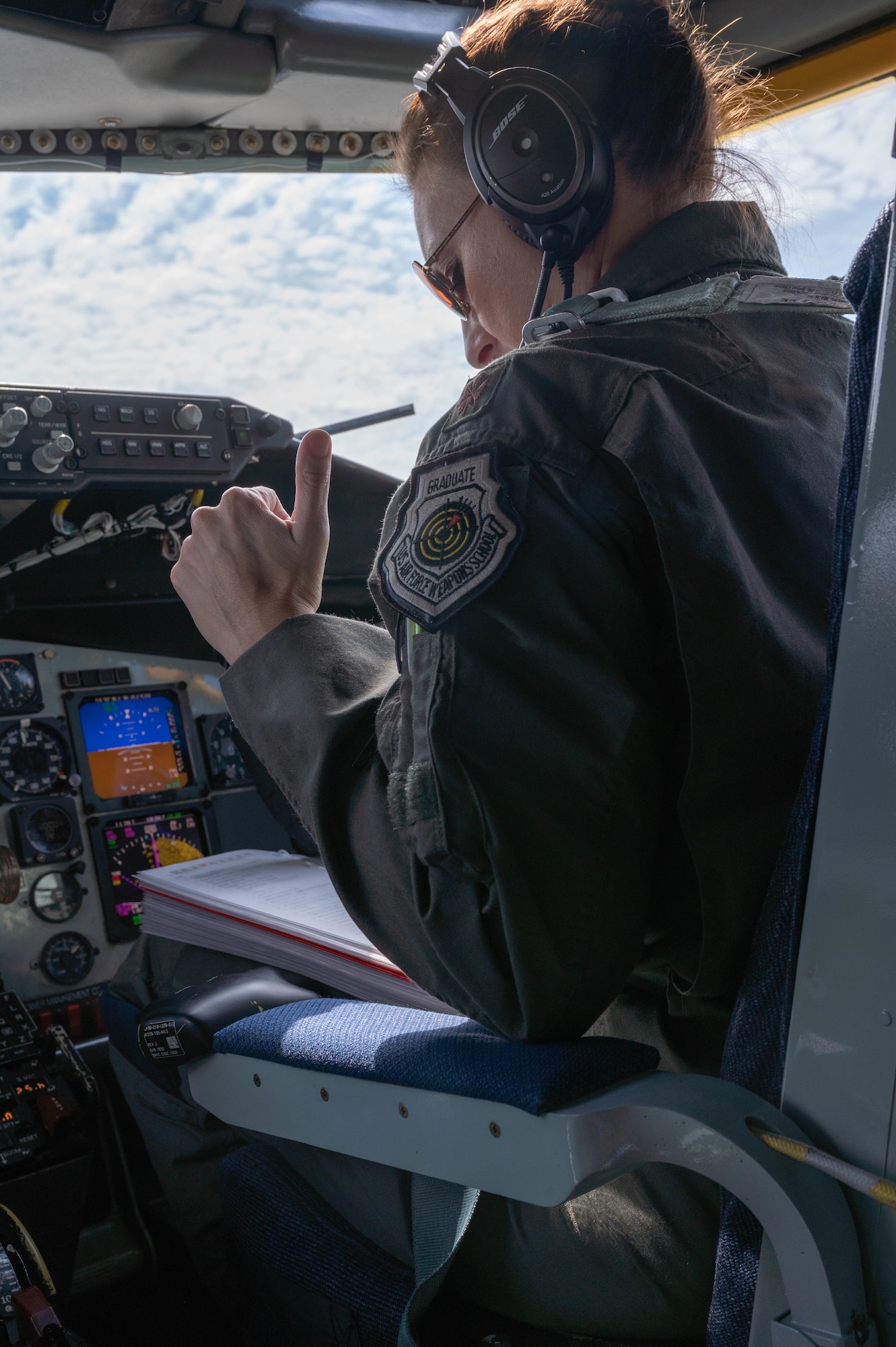 Pilot gives the thumbs up in a KC-135R Stratotanker