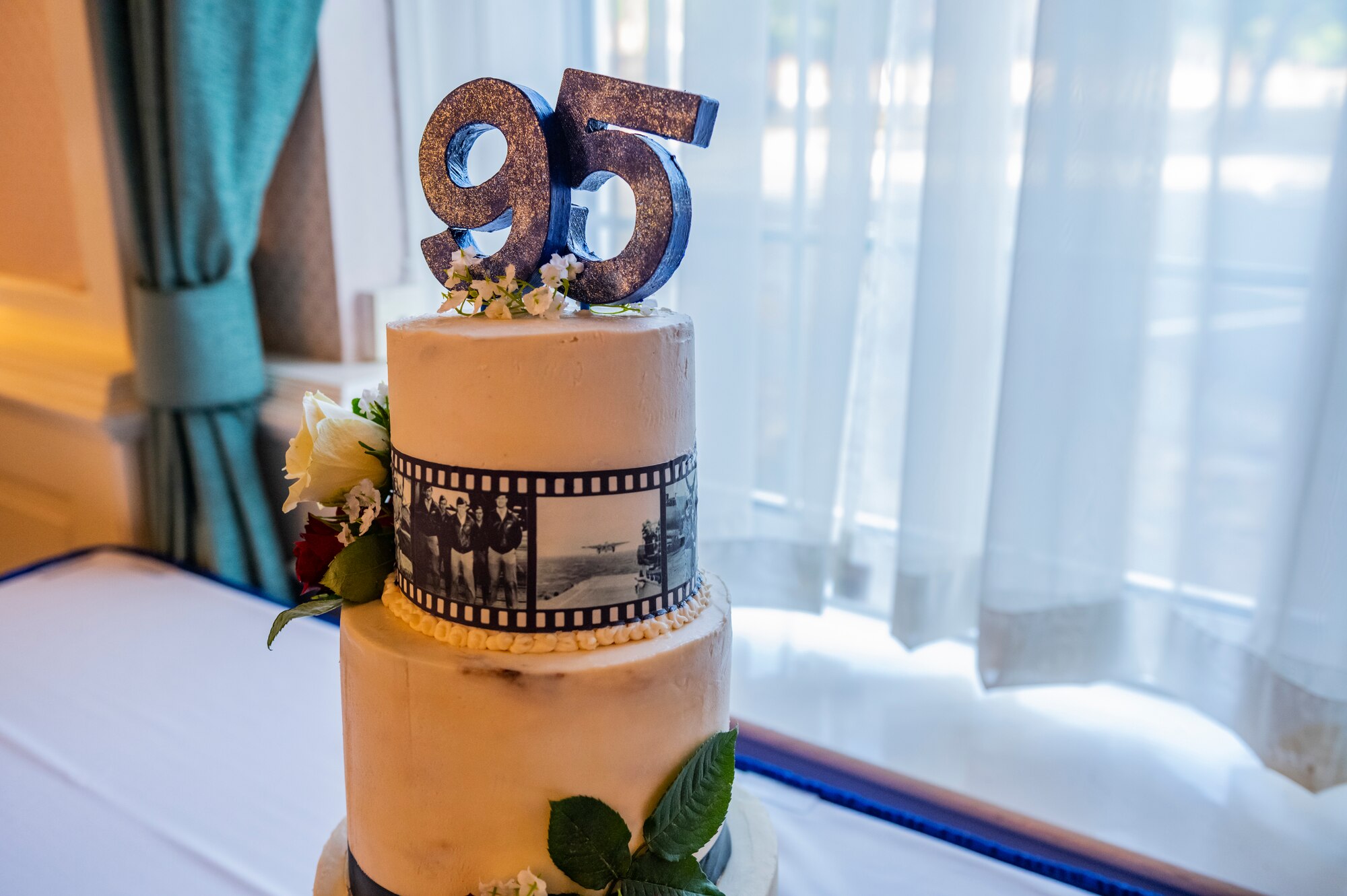 A cake featuring historical imagery sits on display at the 95th Reconnaissance Squadron’s 105th anniversary celebration at Royal Air Force Mildenhall, England, Aug. 19, 2022. The 95th RS was first activated as the 95th Aero Squadron on Aug. 20, 1917, at Kelly Field, Texas, and has subsequently held a variety of mission sets through nearly every major conflict to date.