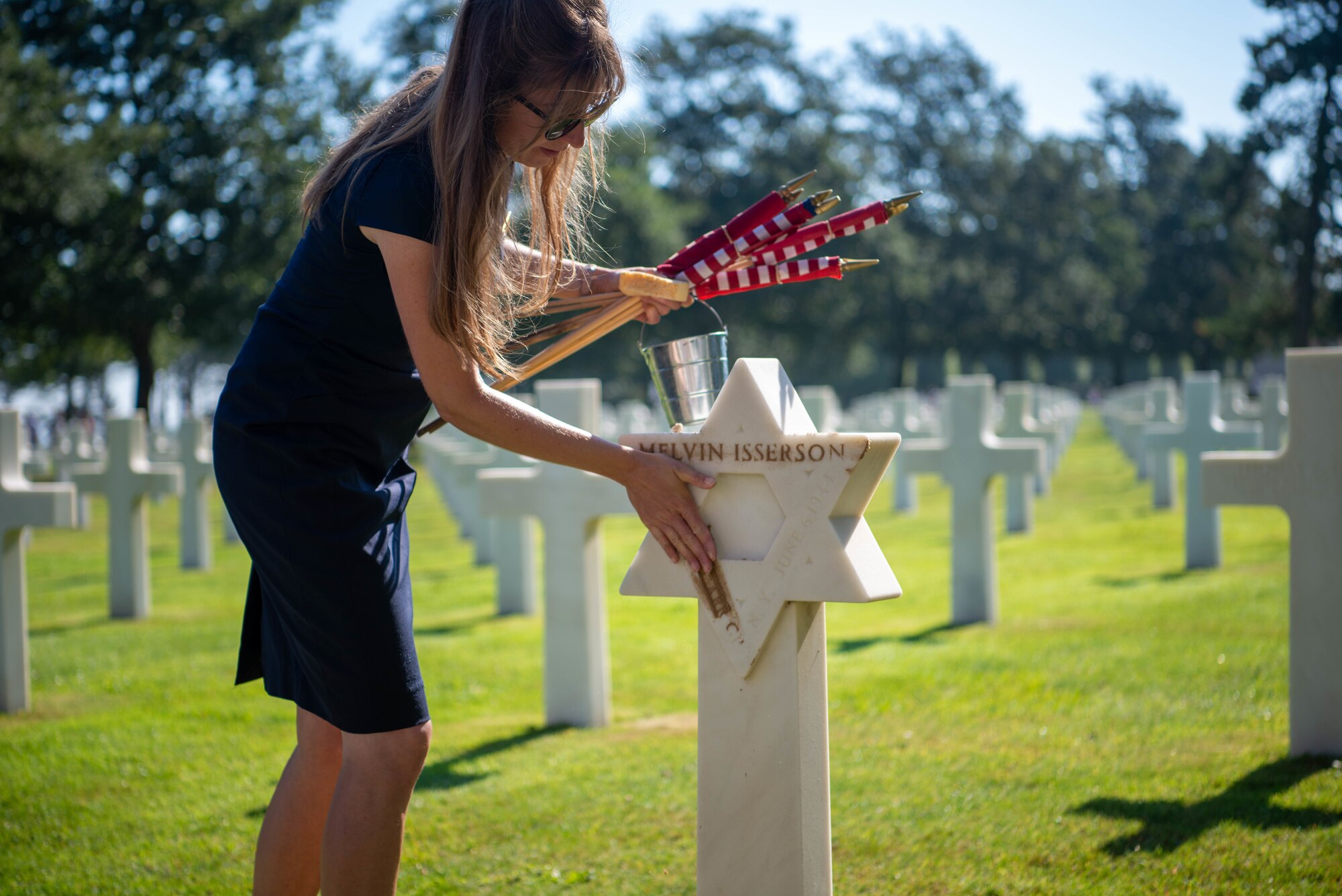 girl touches cross