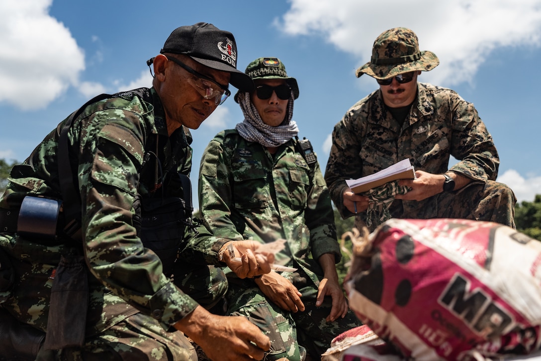 Royal Thai Armed Forces SM1 Uthon Namsuwan, a Thailand Mine Action Center Explosive Ordnance Disposal student with Humanitarian Mine Action Unit 3, performs a render safe technique on an 81mm high explosive mortar during an HMA EOD Level 3 course at Ta Mor Roi Training area in Surin Province, Thailand, Jul. 29, 2022. Royal Thai and American Armed Forces work together to train TMAC students in EOD level 3 in order to develop an EOD capacity to assist TMAC’s mission of becoming landmine free. This partnership is aligned with the U.S. Department of Defense’s Humanitarian Mine Action Program, which assists partnered nations affected by landmines, explosive remnants of war, and the hazardous effects of unexploded ordnance. (U.S. Marine Corps photo by Cpl. Moises Rodriguez)