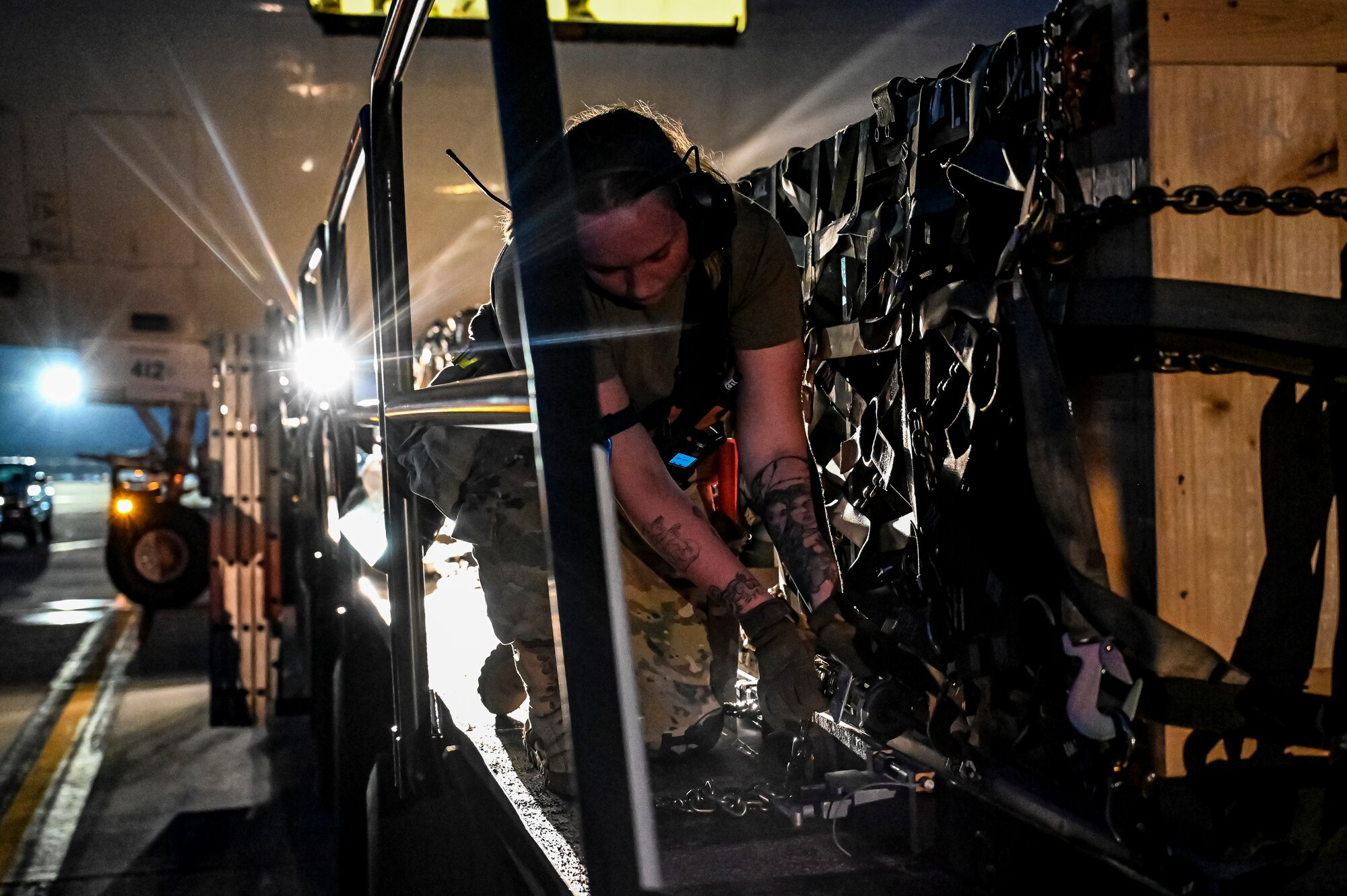 Airman 1st Class Hannah Watkins, 305th Aerial Port Squadron air transportation, prepares an upload of Guided Multiple Launch Rocket System munitions at Joint Base McGuire-Dix-Lakehurst, N.J., Aug. 11, 2022. The munitions cargo is part of an additional security assistance package for Ukraine. The security assistance the U.S. is providing to Ukraine is enabling critical success on the battlefield against the Russian invading force. (U.S. Air Force photo by Senior Airman Matt Porter)