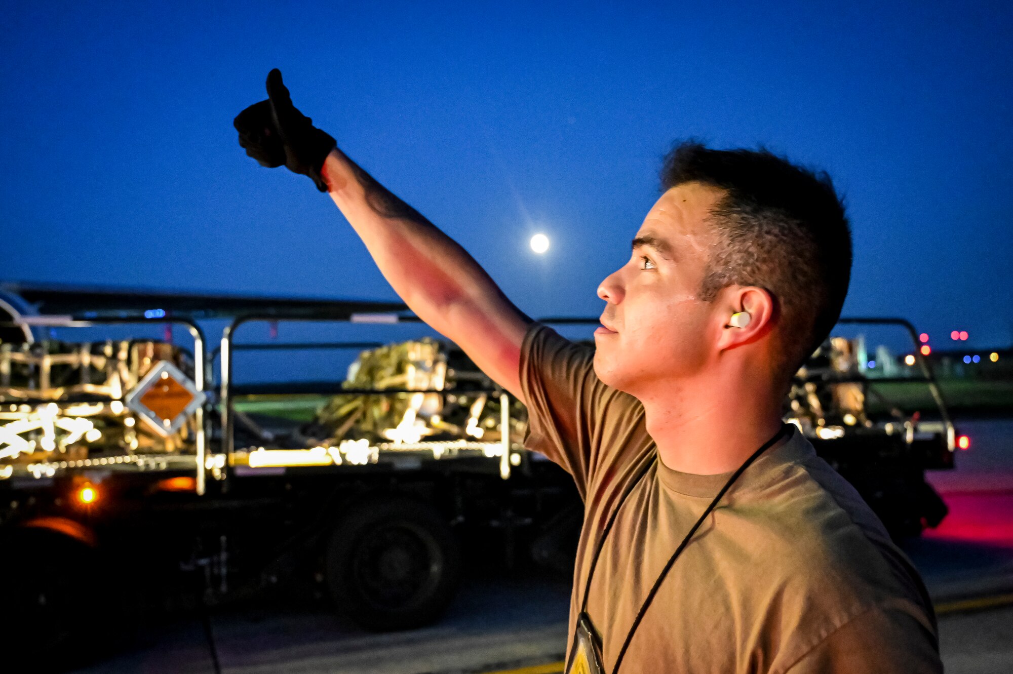 U.S. Air Force Staff Sgt. Rafael Guzman-Paniagua, 305th Aerial Port squadron air transportation, prepares an upload of Guided Multiple Launch Rocket System munitions at Joint Base McGuire-Dix-Lakehurst, N.J., Aug. 11, 2022. The munitions cargo is part of an additional security assistance package for Ukraine. The security assistance the U.S. is providing to Ukraine is enabling critical success on the battlefield against the Russian invading force. (U.S. Air Force photo by Senior Airman Matt Porter)
