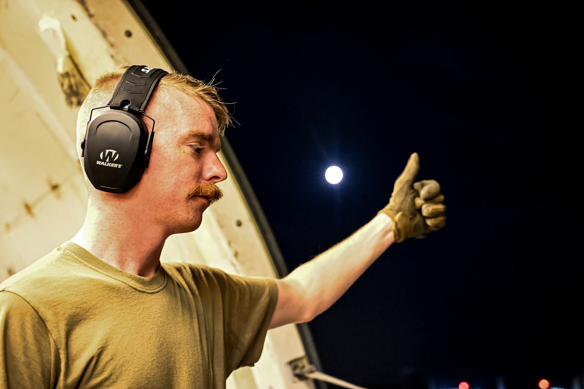 U.S. Air Force Staff Sgt. Brandon Davis, 305th Aerial Port squadron air transportation, prepares an upload of Guided Multiple Launch Rocket System munitions at Joint Base McGuire-Dix-Lakehurst, N.J., Aug. 11, 2022. The munitions cargo is part of an additional security assistance package for Ukraine. The security assistance the U.S. is providing to Ukraine is enabling critical success on the battlefield against the Russian invading force. (U.S. Air Force photo by Senior Airman Matt Porter)
