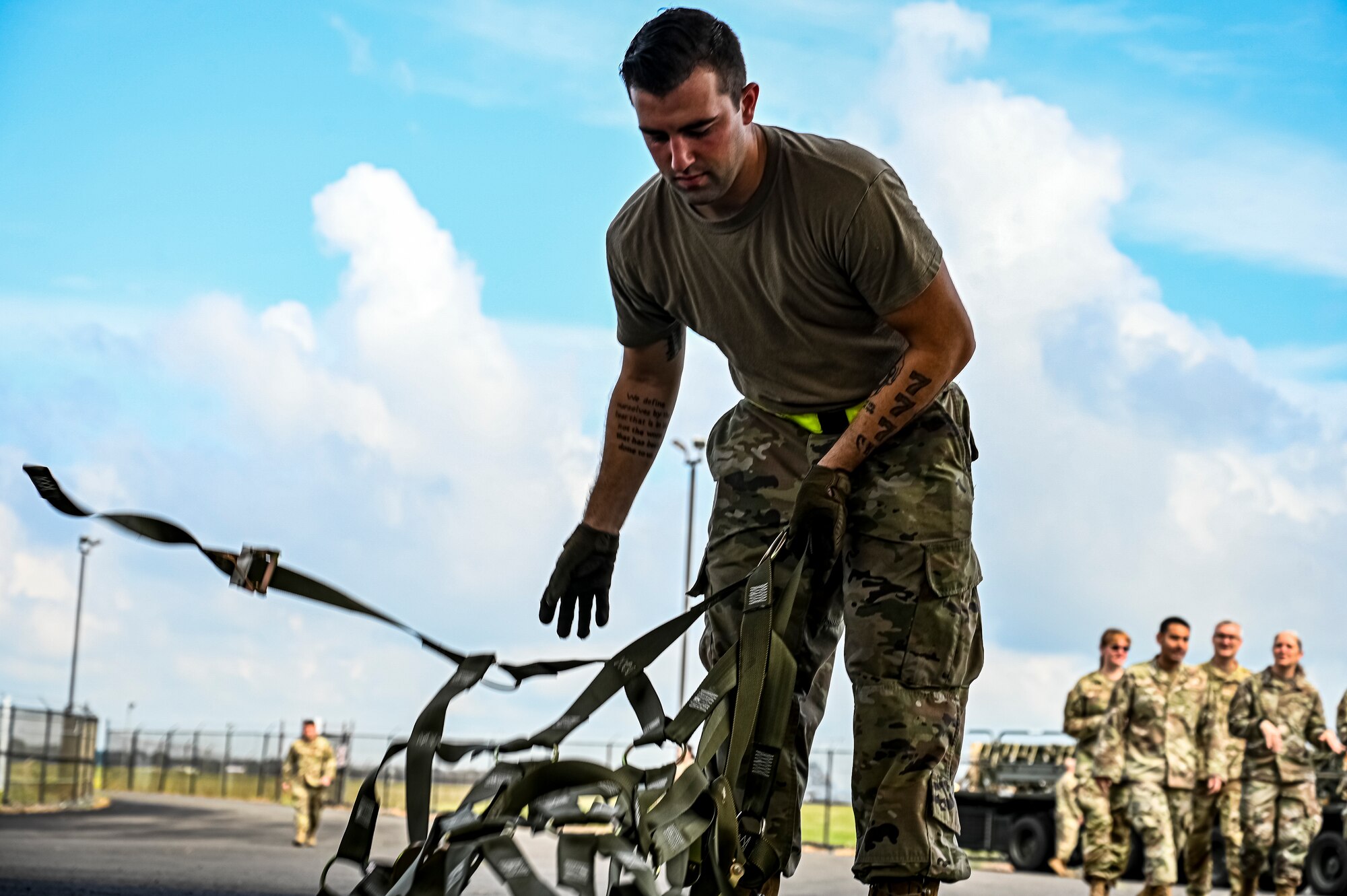 Senior Airman David Martinelli, 305th Aerial Port Squadron air transportation, assembles pallets of Guided Multiple Launch Rocket System munitions for upload to a Boeing 767 at Joint Base McGuire-Dix-Lakehurst, N.J., Aug. 12, 2022. The munitions cargo is part of an additional security assistance package for Ukraine. The security assistance the U.S. is providing to Ukraine is enabling critical success on the battlefield against the Russian invading force. (U.S. Air Force photo by Senior Airman Matt Porter)