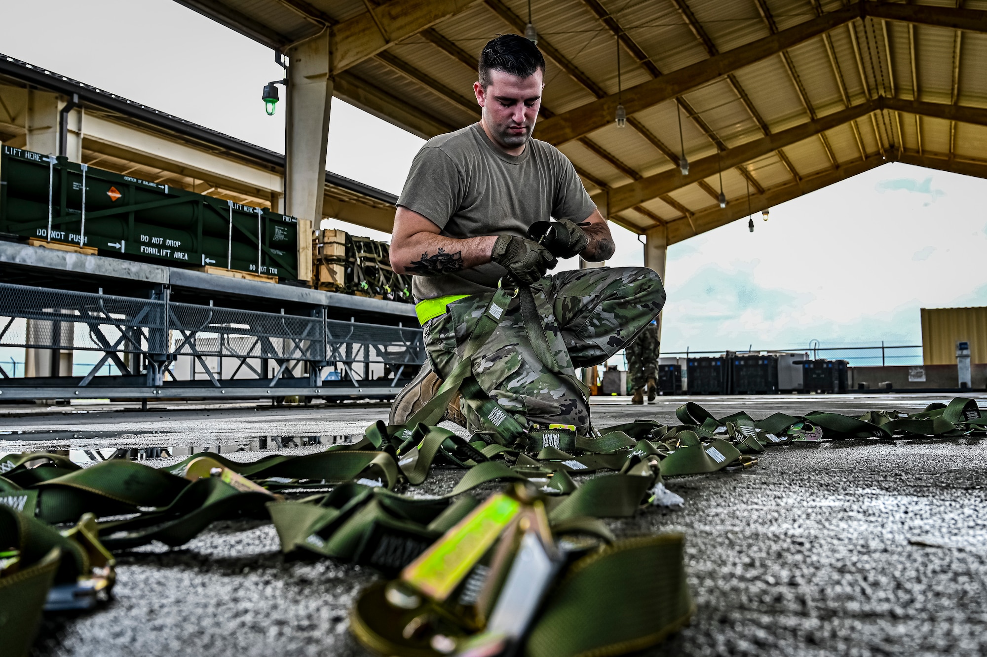 Senior Airman David Martinelli, 305th Aerial Port Squadron air transportation, assembles pallets of Guided Multiple Launch Rocket System munitions for upload to a Boeing 767 at Joint Base McGuire-Dix-Lakehurst, N.J., Aug. 12, 2022. The munitions cargo is part of an additional security assistance package for Ukraine. The security assistance the U.S. is providing to Ukraine is enabling critical success on the battlefield against the Russian invading force. (U.S. Air Force photo by Senior Airman Matt Porter)