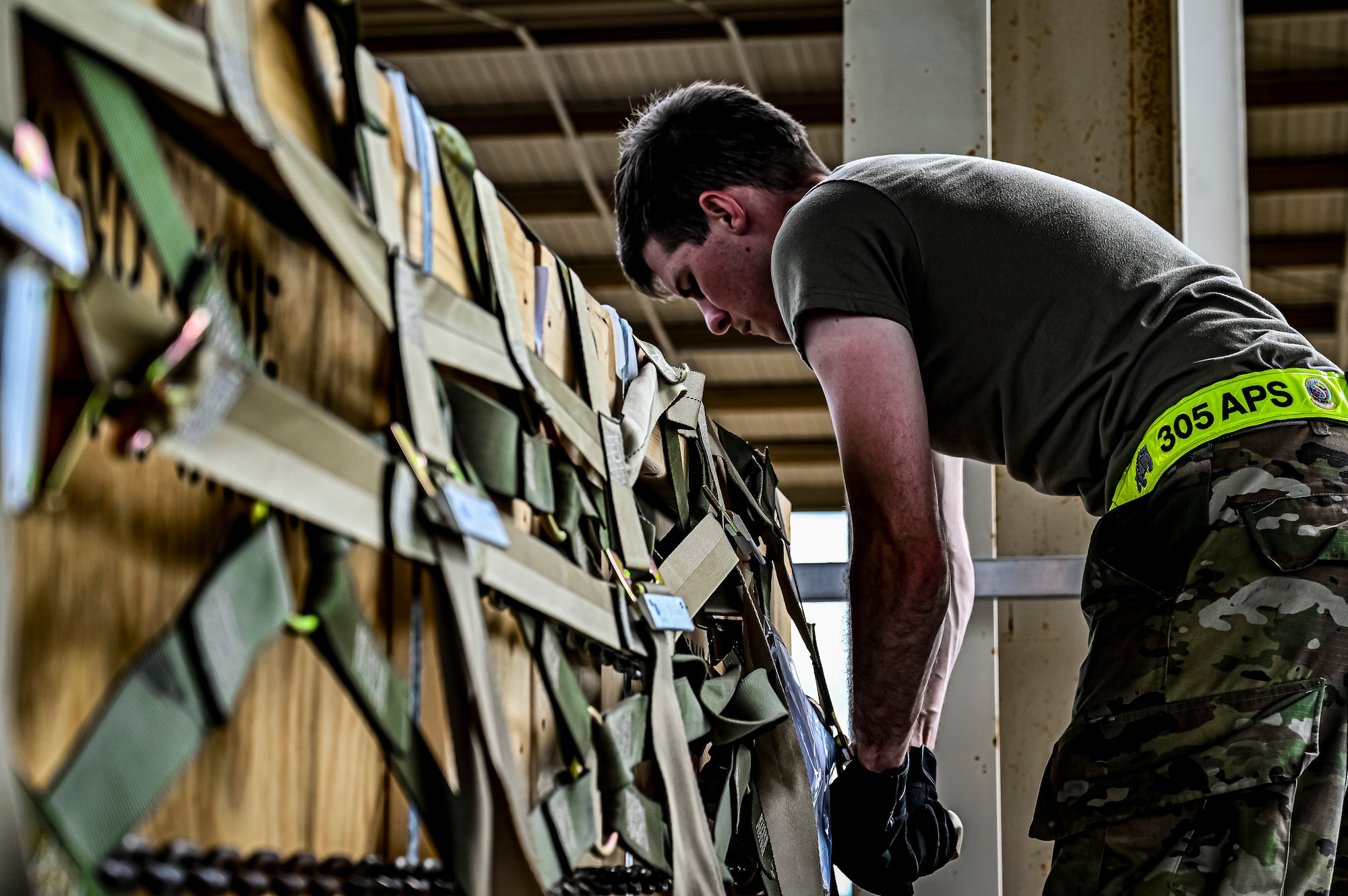 Senior Airman Andrew Griffith, 305th Aerial Port Squadron air transportation, assembles pallets of Guided Multiple Launch Rocket System munitions for upload to a Boeing 767 at Joint Base McGuire-Dix-Lakehurst, N.J., Aug. 12, 2022. The munitions cargo is part of an additional security assistance package for Ukraine. The security assistance the U.S. is providing to Ukraine is enabling critical success on the battlefield against the Russian invading force. (U.S. Air Force photo by Senior Airman Matt Porter)