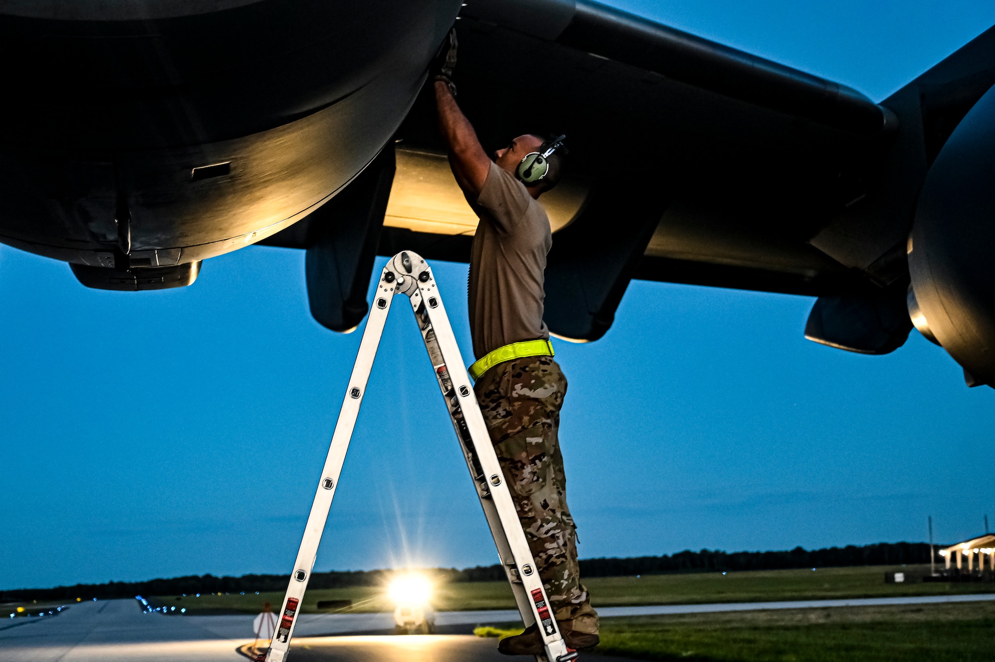 An Airman assigned to the 14th Airlift Squadron performs maintenance on a C-17 Globemaster III at Joint Base McGuire-Dix-Lakehurst, N.J., Aug. 13, 2022. The munitions cargo is part of an additional security assistance package for Ukraine. The security assistance the U.S. is providing to Ukraine is enabling critical success on the battlefield against the Russian invading force.  (U.S. Air Force photo by Senior Airman Matt Porter)
