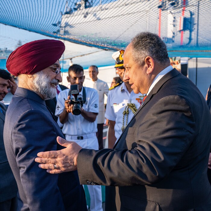 Secnav Carlos Del Toro greets Ambassador Taranjit Singhu Sandhu, ambassador of India to the United States, ahead of a reception aboard the Indian Shivalik-class frigate INS Satpura (F48)