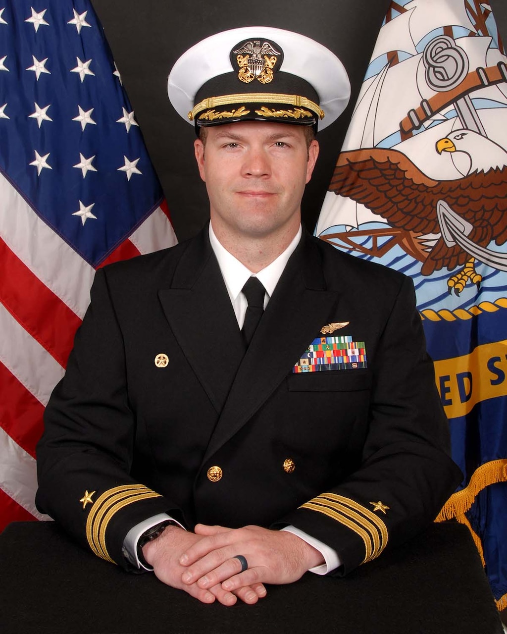 Commander Joshua M. Ales