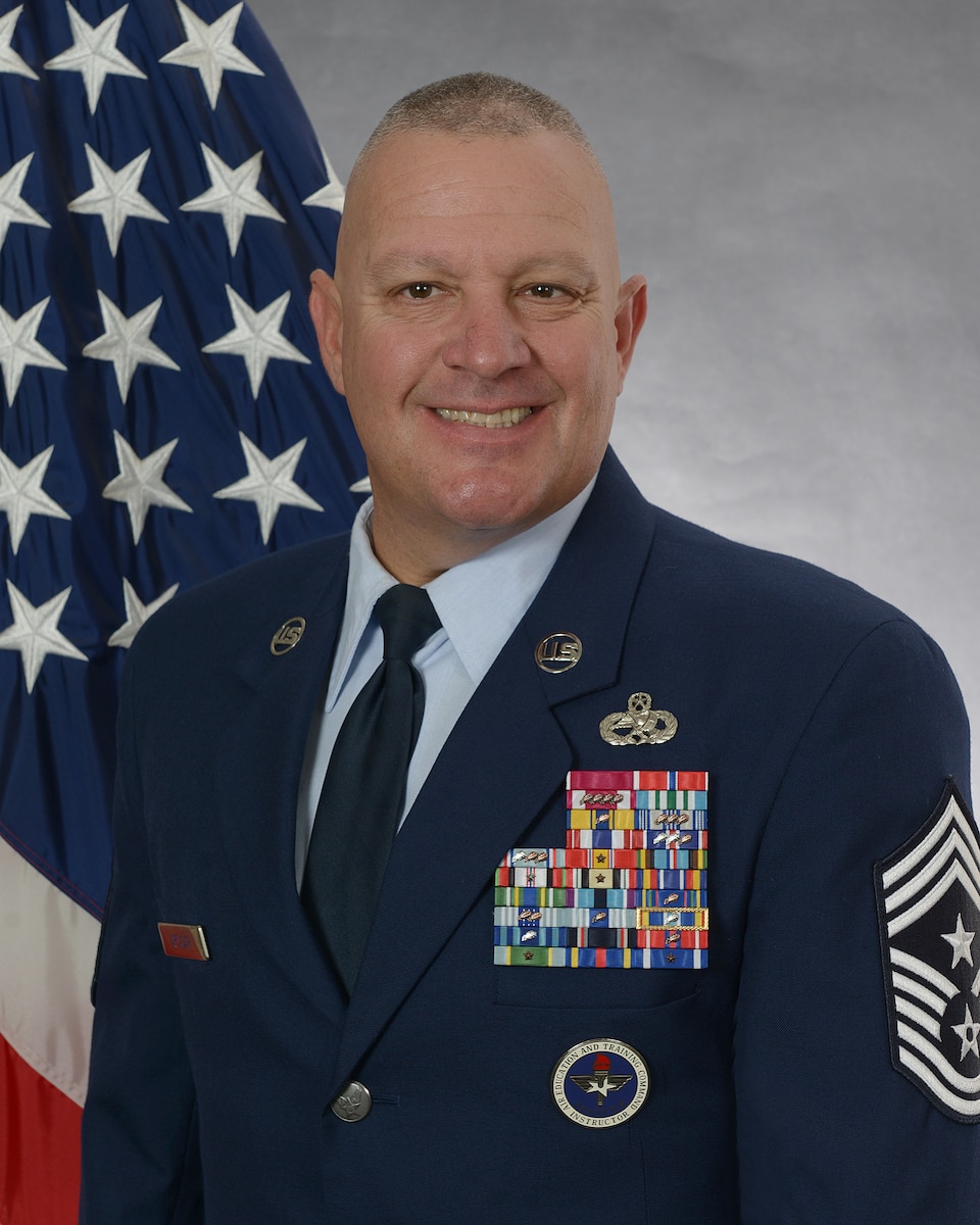 Official photo of Chief Master Sgt. Justin G. Apticar