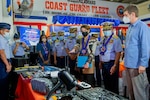 U.S. Ambassador Carlson, PCG Deputy Commandant Vice Admiral Fabricante, and INL Manila Director Kelia Cummins inspect U.S.-donated maritime tactical gear and maintenance equipment for the PCG during the turnover ceremony at the PCG headquarters in Manila on August 22.