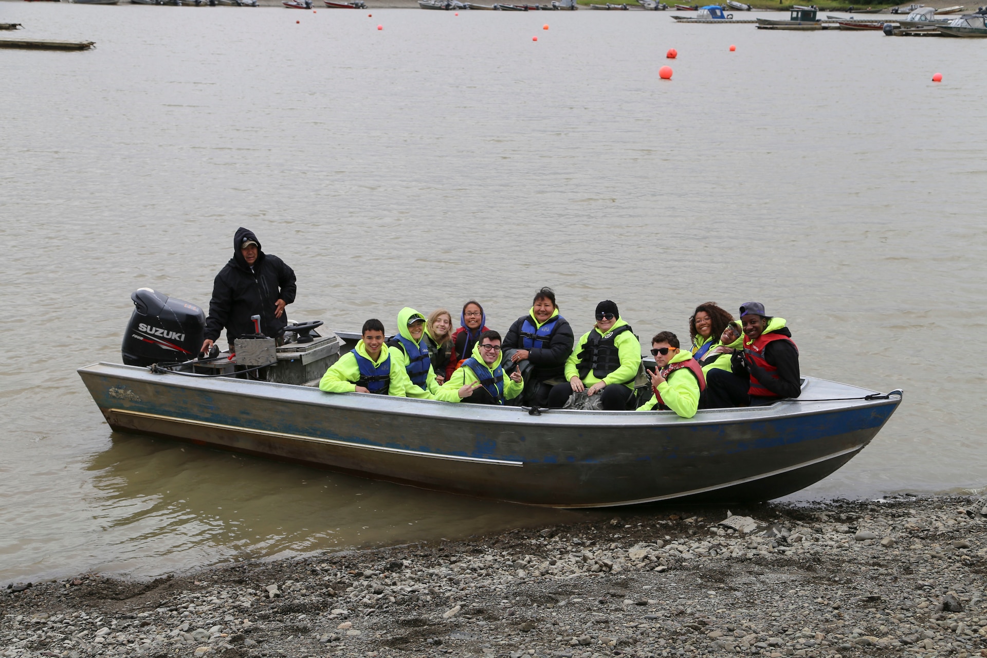 Sgt. 1st Class Joseph Sallaffie, then a staff sergeant, navigates his boat in the Kuskowim River to return participants from the Alaska National Guard Warrior and Family Services cultural camp after visiting Sallaffie’s subsistence fish-camp near Bethel, July 21, 2016.