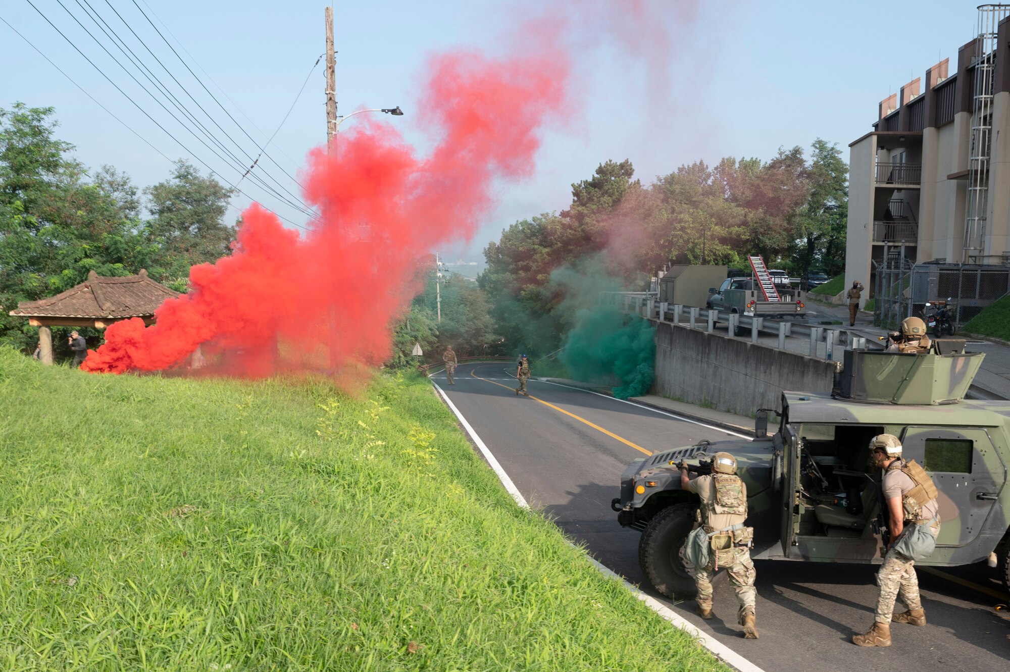 Airmen assigned to the 51st Security Forces Squadron respond to a simulated attack as part of a base-wide training event at Osan Air Base