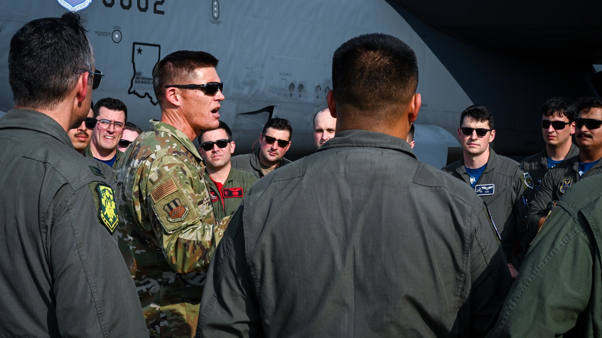 Col. Scott Weyermuller, 2nd Bomb Wing commander, greets aircrew from the 96th Bomb Squadron and mobile maintenance teams from the 2nd Aircraft Maintenance Squadron after their return home at Barksdale Air Force Base, Louisiana, Aug. 19, 2022. The aircrew and maintenance teams flew to and participated in a four-day Agile Combat Employment exercise at Fairchild Air Force Base, Washington. (U.S. Air Force photo by Airman Nicole Ledbetter)