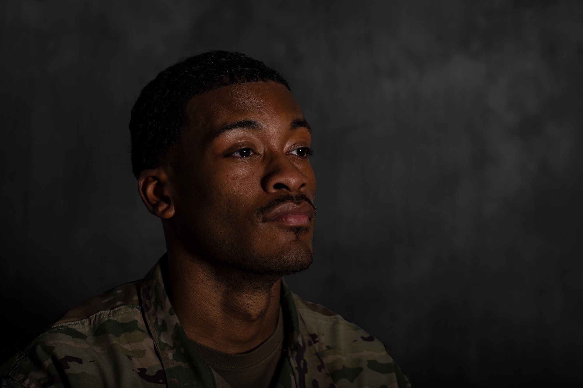 Tech. Sgt. James Pollard, 28th Bomb Squadron NCO in charge of aviation resource management, reflects on one year since Operation Allies Refuge and Allies Welcome at Dyess Air Force Base, Texas, Aug. 23, 2022. Pollard arrived at the 86th Aeromedical Evacuations Squadron in 2021 where he supported OAR and OAW by building medical kits for in-flight treatments at Ramstein Air Base, Germany. The total force operation involved more than 500 active duty, Reserve and National Guard aircrews flying missions around the clock to evacuate more than 124,000 people. (U.S. Air Force photo by Airman 1st Class Ryan Hayman)