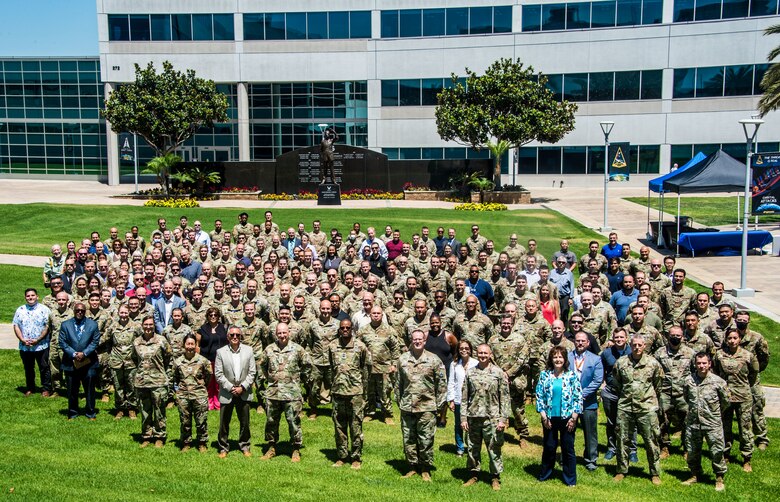 Space Systems Command leaders joined with Guardians, Airmen, civilians and contractors for a group photo in the Schriever Courtyard. SSC celebrated its one-year anniversary as a USSF Field Command, at Los Angeles Air Force Base, El Segundo, Calif., August 12, 2022. (U.S. Space Force photo by Van Ha)