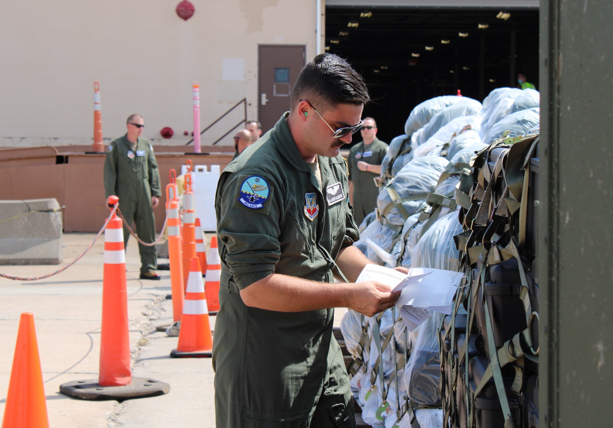 Airman performs final cargo check paperwork for exercise Agile Thunder 22-02