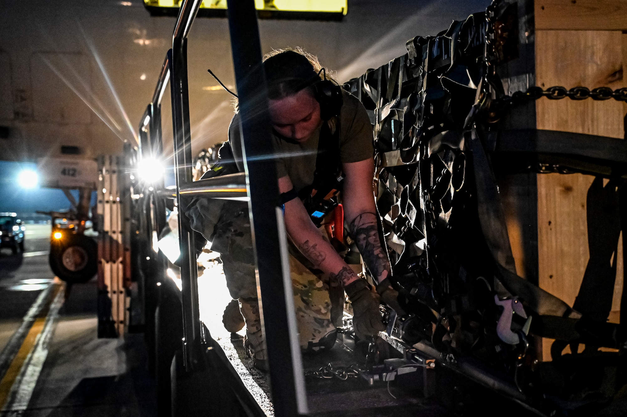 Airman 1st Class Hannah Watkins, 305th Aerial Port Squadron air transportation, prepares an upload of Guided Multiple Launch Rocket System munitions at Joint Base McGuire-Dix-Lakehurst, N.J., Aug. 11, 2022. The munitions cargo is part of an additional security assistance package for Ukraine. The security assistance the U.S. is providing to Ukraine is enabling critical success on the battlefield against the Russian invading force. (U.S. Air Force photo by Senior Airman Matt Porter)
