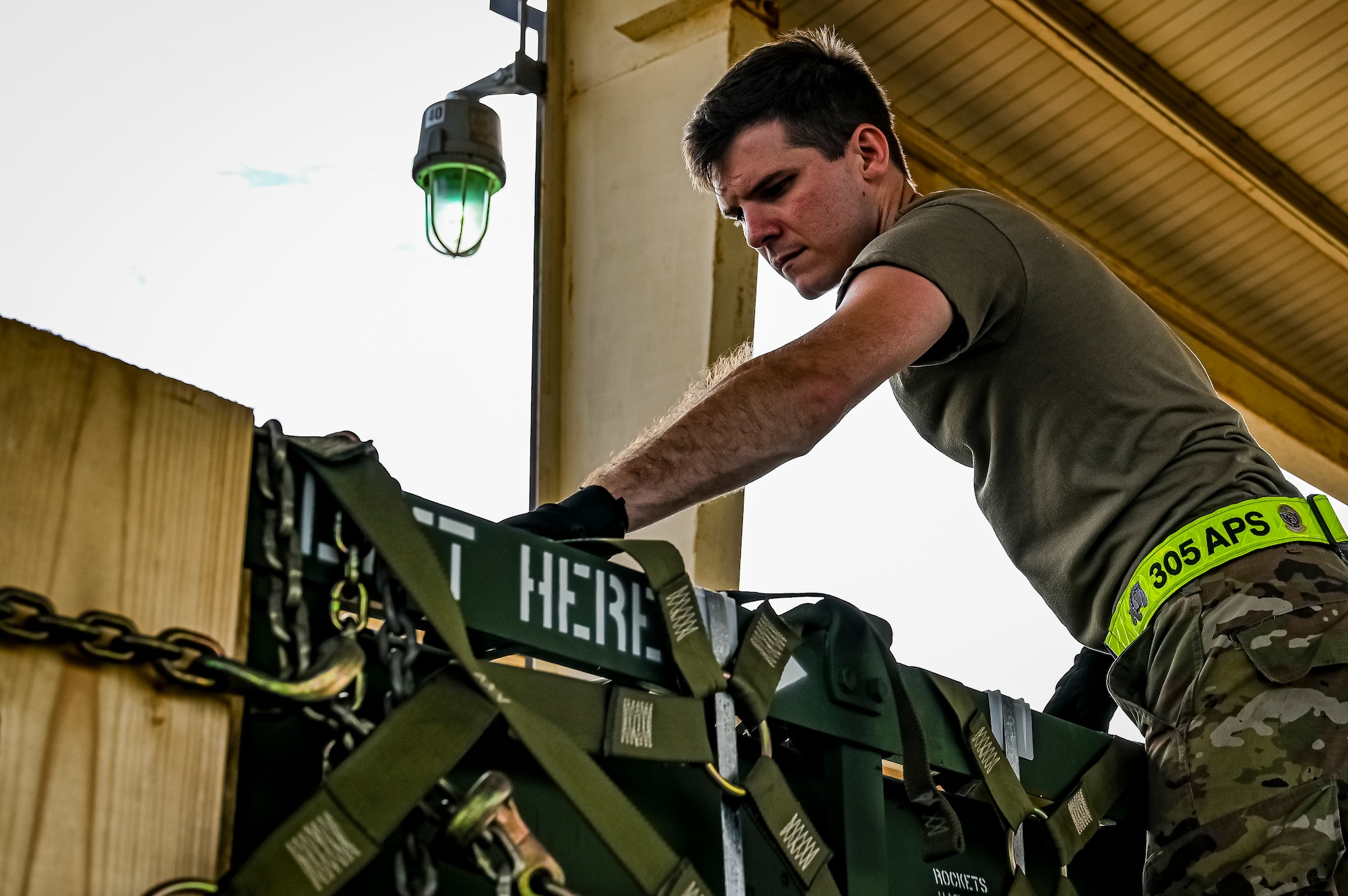Senior Airman Andrew Griffith, 305th Aerial Port Squadron air transportation, assembles pallets of Guided Multiple Launch Rocket System munitions for upload to a Boeing 767 at Joint Base McGuire-Dix-Lakehurst, N.J., Aug. 12, 2022. The munitions cargo is part of an additional security assistance package for Ukraine. The security assistance the U.S. is providing to Ukraine is enabling critical success on the battlefield against the Russian invading force. (U.S. Air Force photo by Senior Airman Matt Porter)