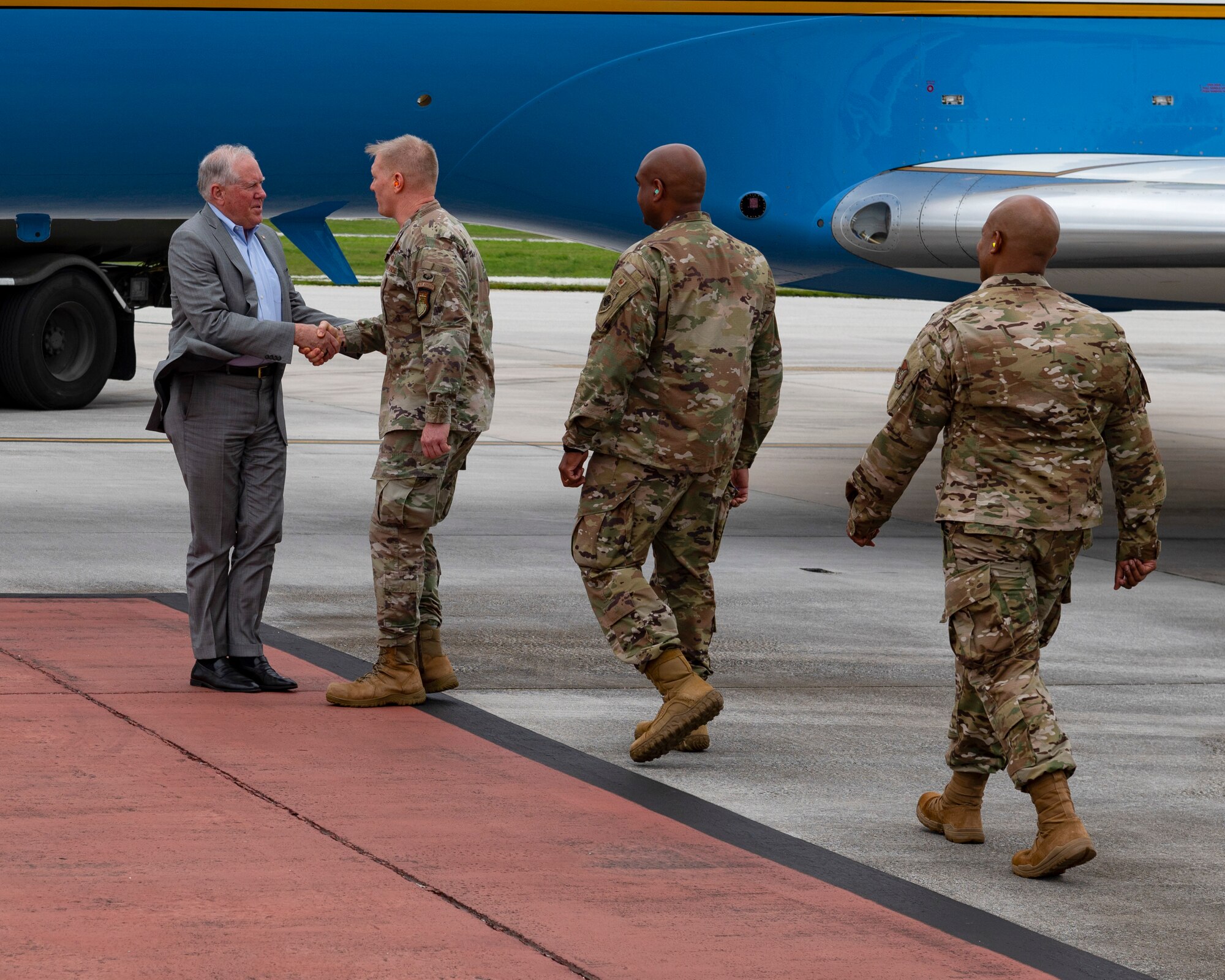 Secretary of the Air Force Frank Kendall is greeted by 36th Wing leadership at Andersen Air Force Base, Guam, Aug. 19, 2022.
