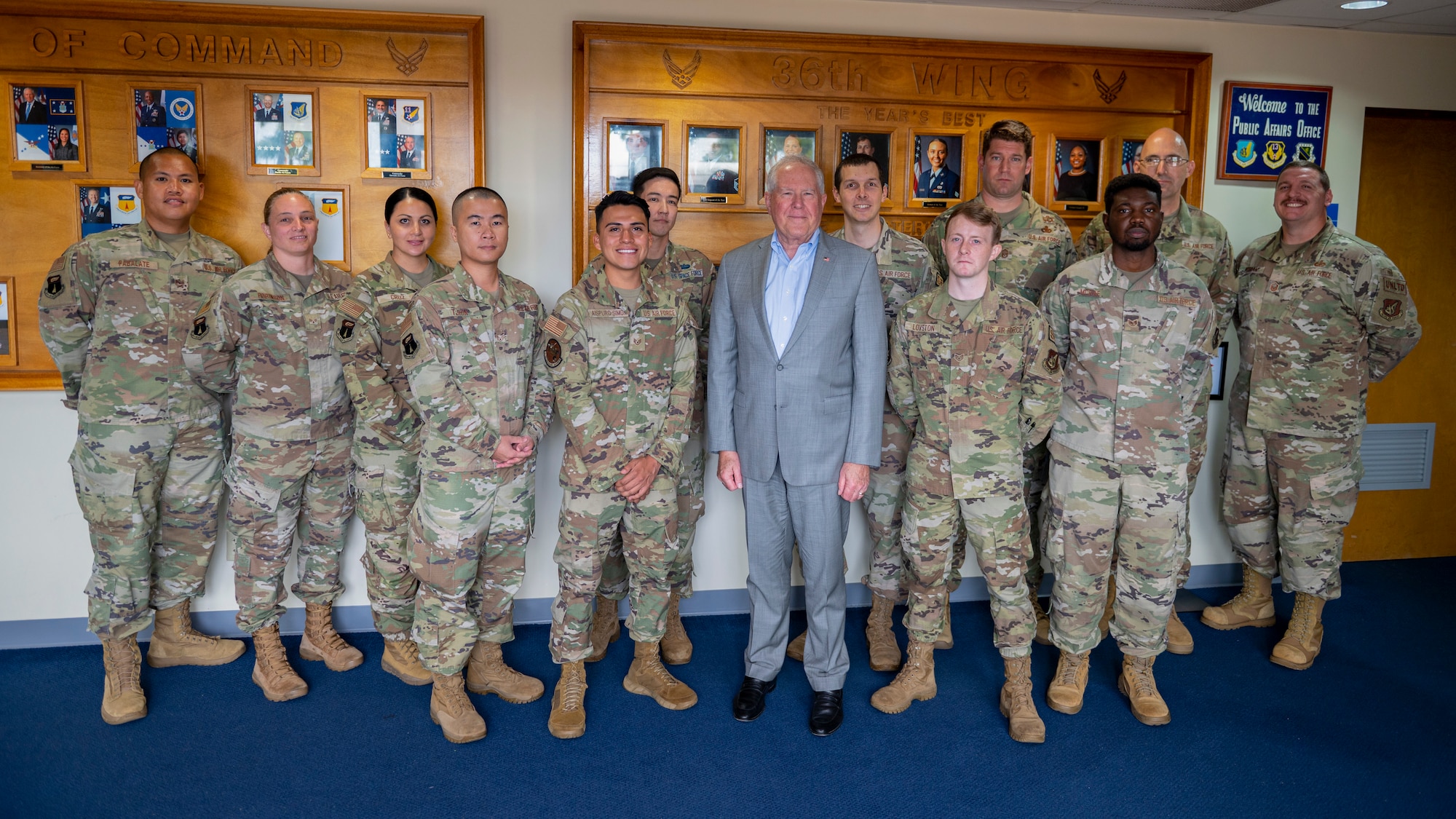 Secretary of the Air Force Frank Kendall and Team Andersen Airmen and Guardians pose for a group photo during his visit to Andersen Air Force Base, Guam, Aug.19, 2022.