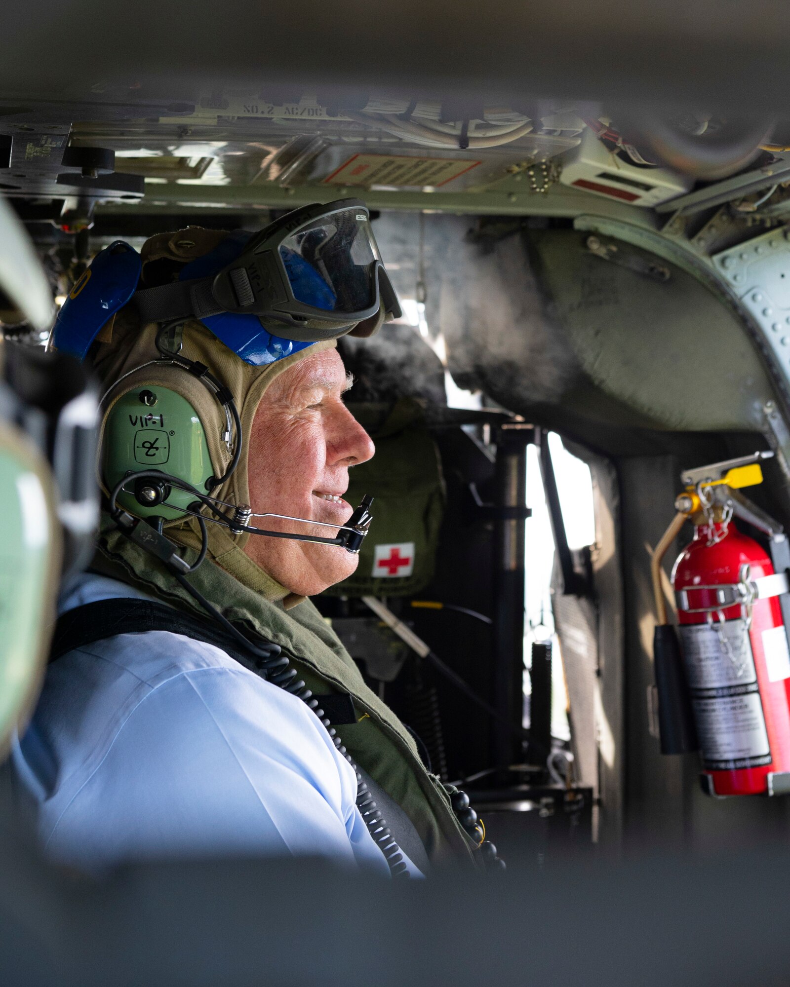 Secretary of the Air Force Frank
Kendall observes the proposed location of a new Singapore Air Force permanent fighter training detachment during a flight on a U.S. Navy MH-60S Seahawk at Andersen Air Force Base, Guam, Aug. 19, 2022.
