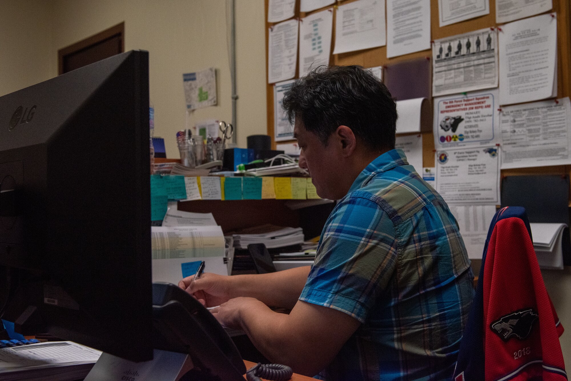 A man works on a computer