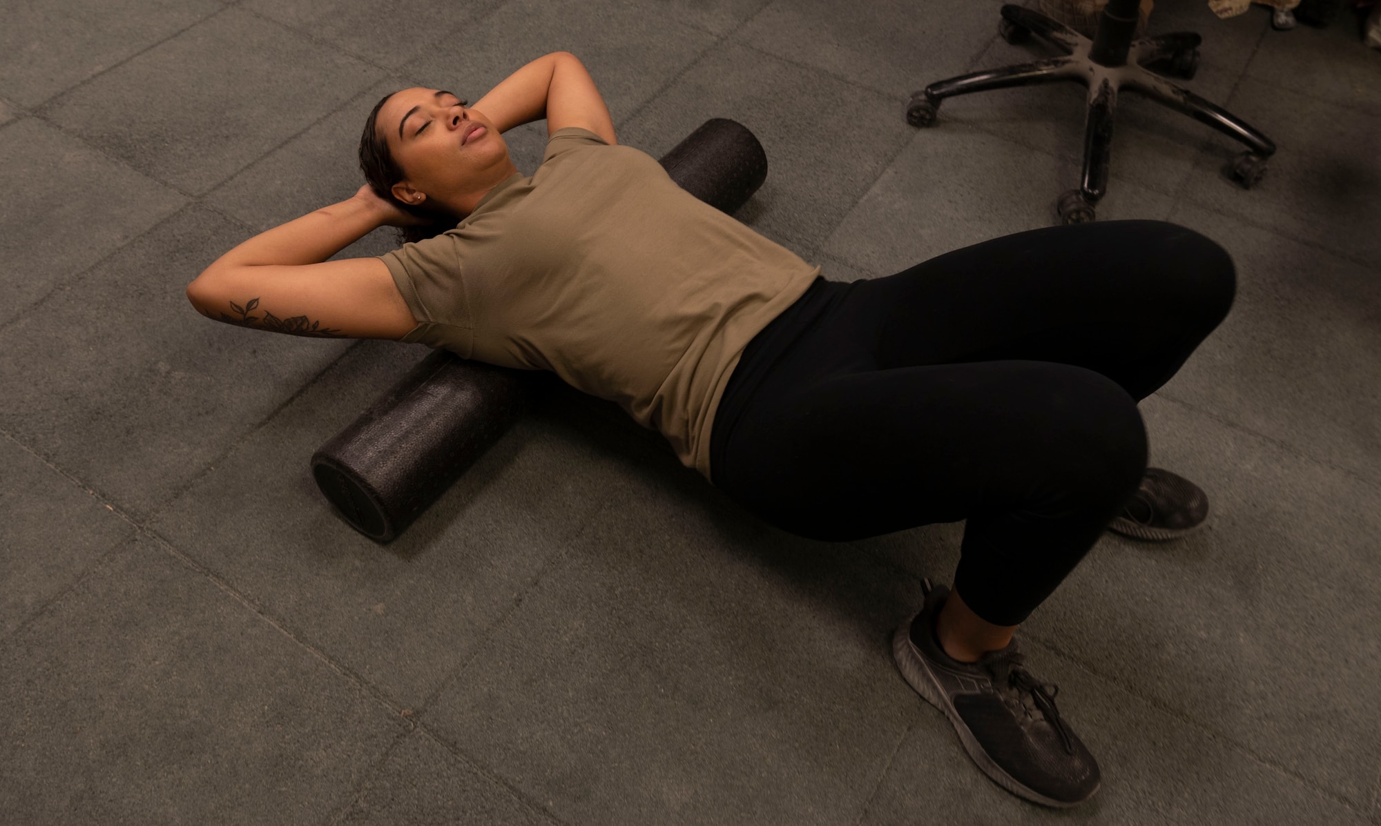 Senior Airman Tyra Hazelhoff Mitchell, 332d Expeditionary Medical Squadron, Physical Therapist Technician, explains rehabilitation and exercise treatment for injured Airmen.