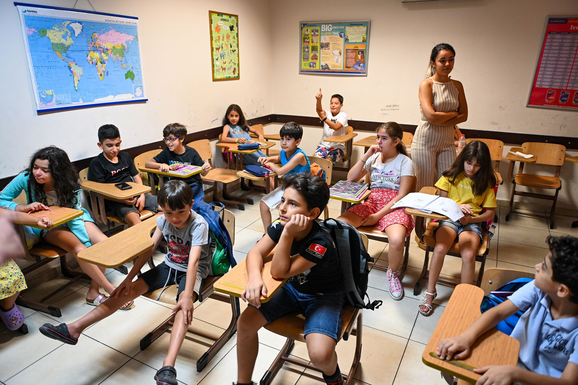 Students in the Turkish-American Association (TAA) participate in a presentation with Airman Leadership School (ALS) Airmen assigned to the 39th Air Base Wing (ABW) at the TAA building in Adana, Turkey, Aug. 23, 2022.