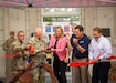 U.S. Army Lt. Gen. John R. Evans, U.S. Army North commanding general, shows Wayne Peacock, president and chief executive of USAA, and the USAA team around the original USAA building to celebrate history with USAA and the U.S. Army during a ribbon cutting ceremony at Building 44 on Joint-Base San Antonio-Fort Sam Houston,Texas, Aug.18, 2022.The ceremony honored USAA’s historical roots among the local San Antonio, Texas community and celebrated the long-standing partnership with U.S. Army North in connection to the building. (U.S. Army photo by Pfc. Gianna Elle Sulger)