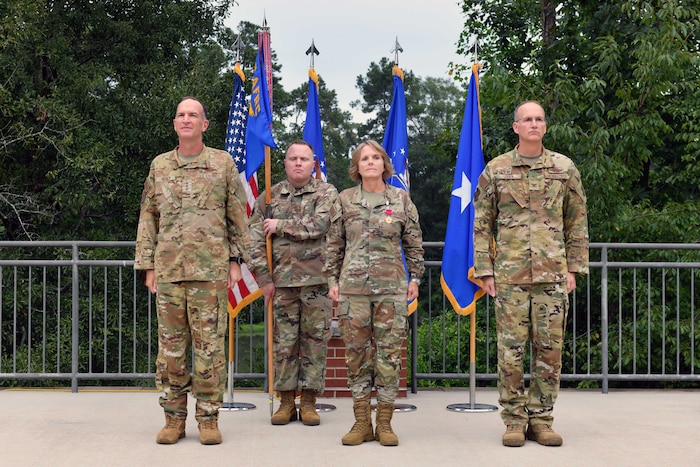 Pictured from left to right is Lt. Gen. John Healy, commander of Air Force Reserve Command and Chief of the Air Force Reserve, Brig. Gen. Stacey Scarisbrick, Director of Logistics, Engineering and Force Protection, and Col. Christopher Zidek, commander of the Force Generation Center.