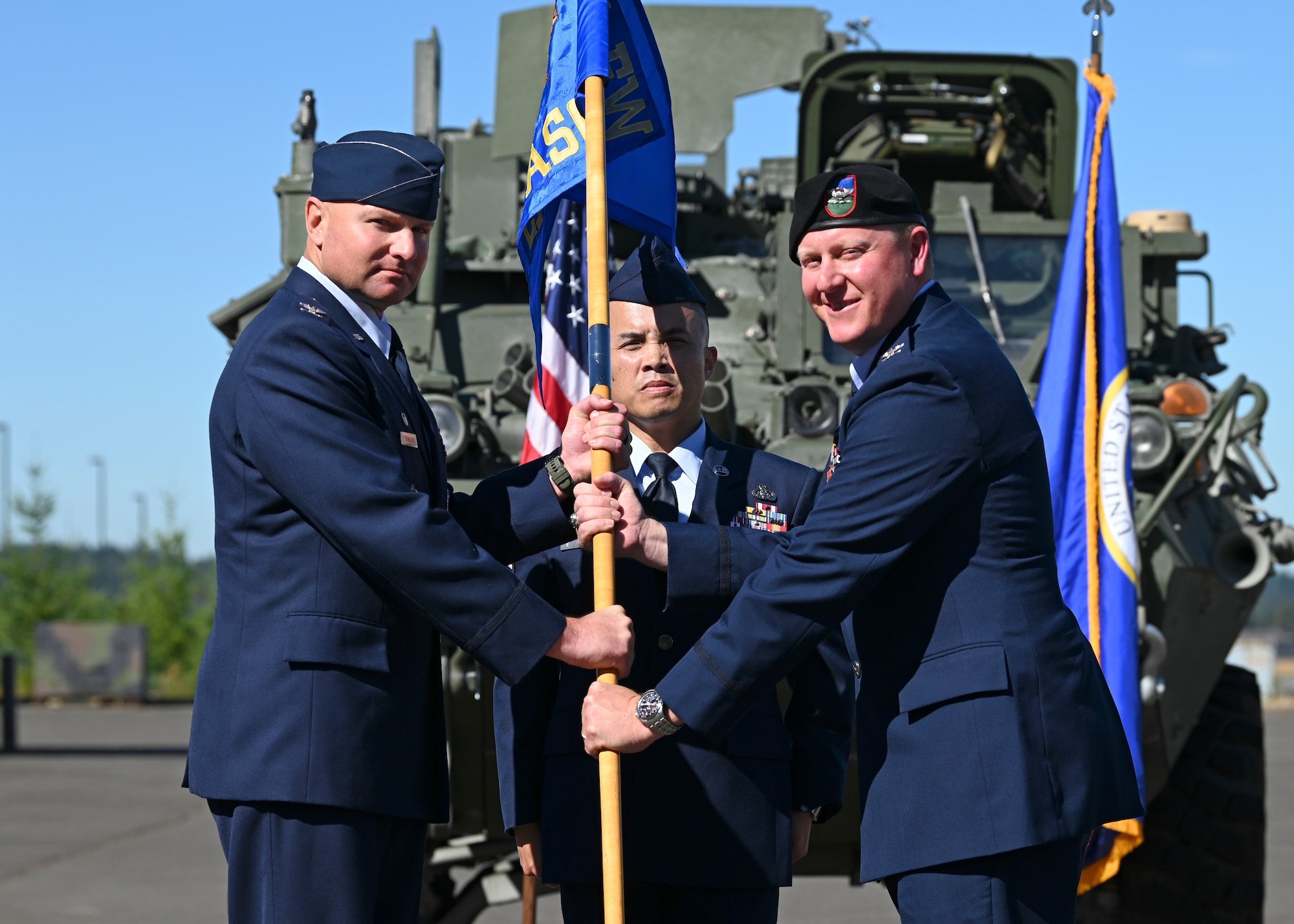 U.S. Air Force Col. John Blocher, right, commander of the 1st Air Support Operations Group, assumes command from Col. David Berkland, commander of the 354th Fighter Wing, during a change of command ceremony at Joint Base Lewis-McChord, Washington, August 15, 2022. The 1st ASOG provides an Air Support Operations Center, Tactical Air Control Parties and Battlefield Weather Teams to Army combat units at multiple echelons including United States Army Pacific, I Corps, and nine aviation, airborne, infantry and Stryker brigade combat teams of the 2nd and 25th Infantry Divisions. (U.S. Air Force photo by Senior Airman Callie Norton)