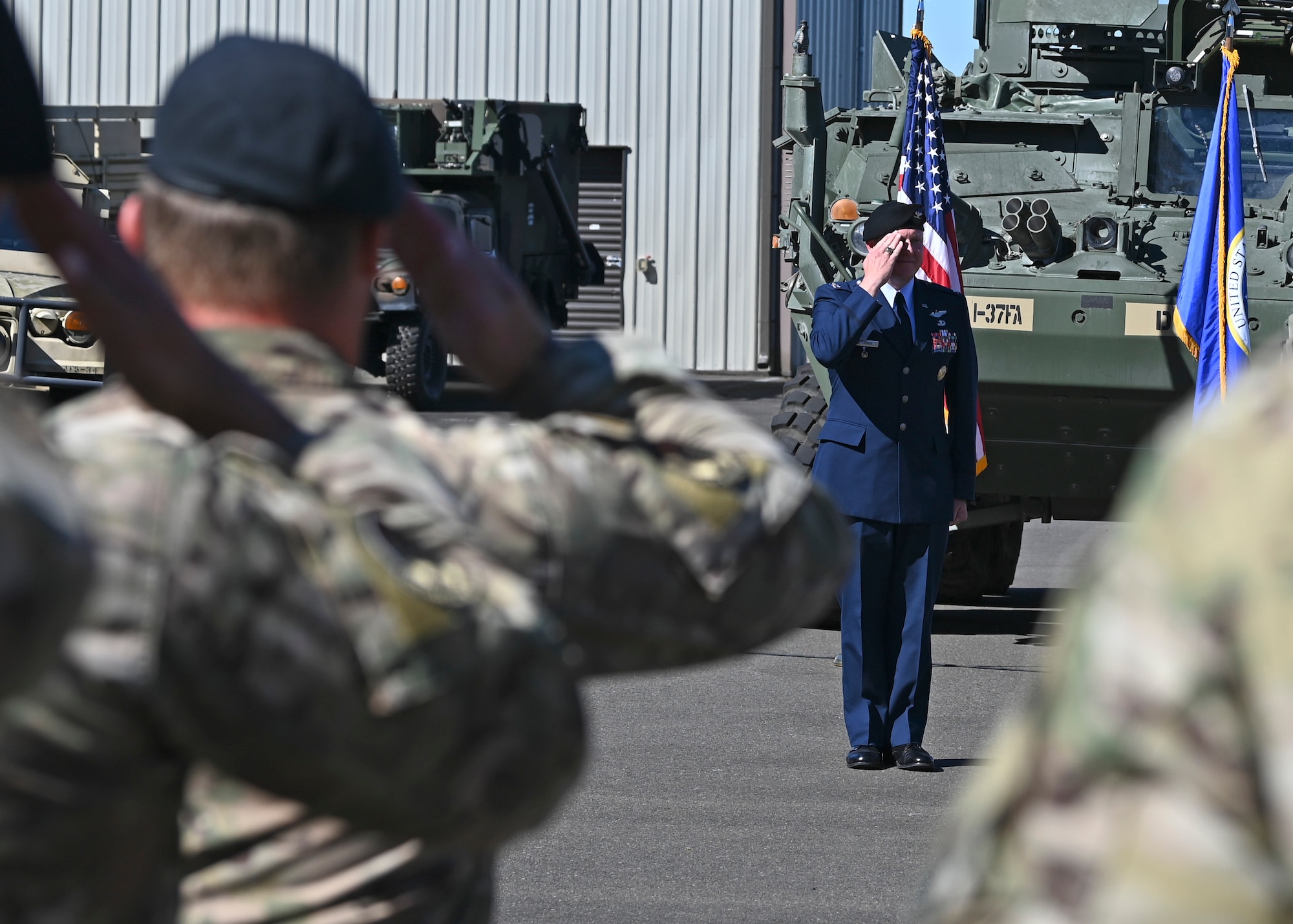 U.S. Air Force Col. John Blocher, incoming commander of the 1st Air Support Operations Group, receives his first salute from the 1st ASOG during a change of command ceremony at Joint Base Lewis-McChord, Washington, August 15, 2022. The 1st ASOG provides an Air Support Operations Center, Tactical Air Control Parties and Battlefield Weather Teams to Army combat units at multiple echelons including United States Army Pacific, I Corps, and nine aviation, airborne, infantry and Stryker brigade combat teams of the 2nd and 25th Infantry Divisions. (U.S. Air Force photo by Senior Airman Callie Norton)