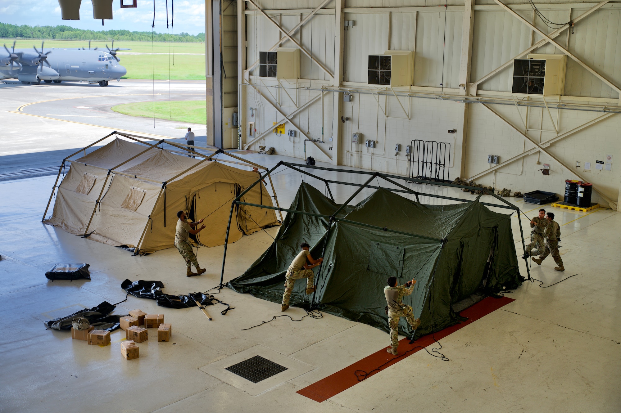 U.S. Air Force Airmen with the 1st Special Operations Mission Support Group’s Mission Sustainment Team, assembles a tent July 17, 2022, at a simulated forward operation base in Georgia during Agile Flag
