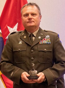 Lt. Col. Andrew Adamczyk, of Springfield, Illinois, a 2002 graduate of the Illinois Army National Guard 129th Regiment (Regional Training Institute) Officer Candidate School, was inducted into the ILARNG OCS Hall of Fame during a ceremony Aug. 21 at the Crowne Plaza hotel in Springfield.
