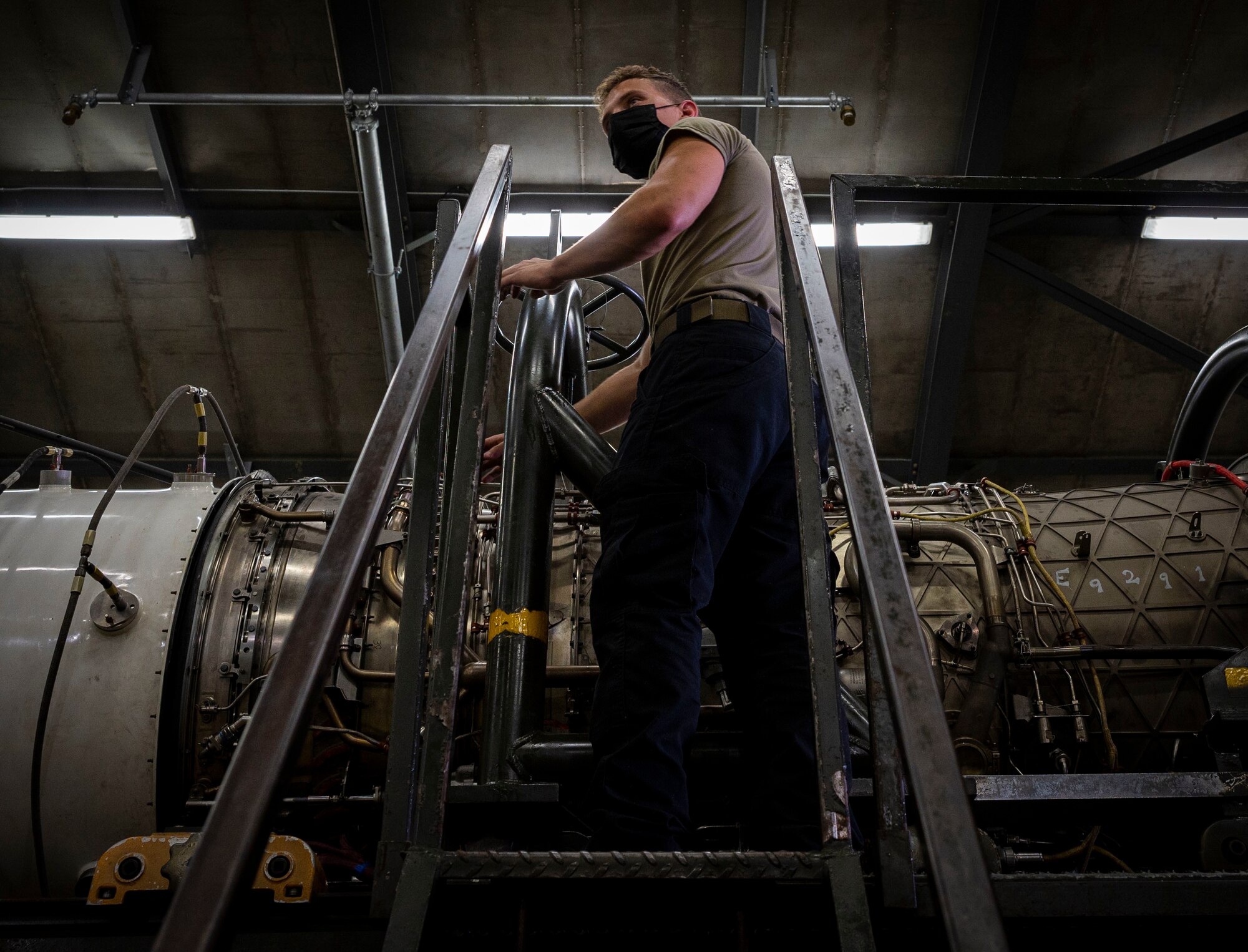 Airman 1st Class Noah Mercer, 4th Component Maintenance Squadron aerospace propulsion technician, inspects the engine of an F-15E Strike Eagle at Seymour Johnson Air Force Base, North Carolina, August 10, 2022. The engine test cell simulates aircraft fire in a specialized hangar, known as a hush house, to ensure that all components of the F-15E engine are functioning properly before use. (U.S. Air Force photo by Airman 1st Class Sabrina Fuller)