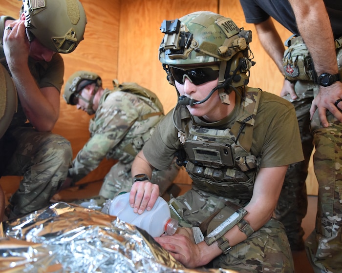 U.S. Air Force Airman 1st Class Caleb Strout, 17th Operational Medical Readiness Squadron flight medicine admin technician, supplies a simulated casualty with oxygen during a training exercise at Melrose Air Force Range, N.M. August 16, 2022. The Medic Rodeo is designed to test the skills of Air Force medical technicians in both deployed and home installation environments. (U.S. Air Force photo by Airman 1st Class Zachary Heimbuch)