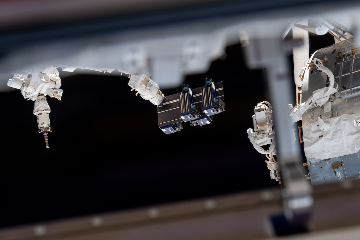 Materials International Space Station Experiment, or MISSE, in the grasp of the International Space Station robotic Special Purpose Dexterous Manipulator. Mission Control personnel on Earth used a robotic arm to relocate MISSE from inside the Japanese Experiment Module airlock to its installation locations on the exterior of Space Station. The MISSE space flight experiment is a collaboration among the Air Force Research Laboratory, NASA, Georgia Tech Research Institute and DuPont to study the effects of space weather exposure on spacecraft materials. (Photo credit / NASA)