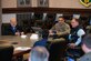 Photo of Dr. Richard “Rick” Spinrad, U.S. Air Force Lt. Gen. David Nahom, retired U.S. Air Force Maj. Gen. Randy “Church” Kee, and U.S. Coast Guard Capt. Leanne Lusk sitting at a conference table and holding a discussion.