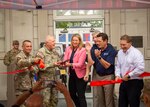 U.S. Army Lt. Gen. John R. Evans, U.S. Army North commanding general, shows Wayne Peacock, president and chief executive of USAA, and the USAA team around the original USAA building to celebrate history with USAA and the U.S. Army during a ribbon cutting ceremony at Building 44 on Joint-Base San Antonio-Fort Sam Houston,Texas, Aug.18, 2022.The ceremony honored USAA’s historical roots among the local San Antonio, Texas community and celebrated the long-standing partnership with U.S. Army North in connection to the building. (U.S. Army photo by Pfc. Gianna Elle Sulger)