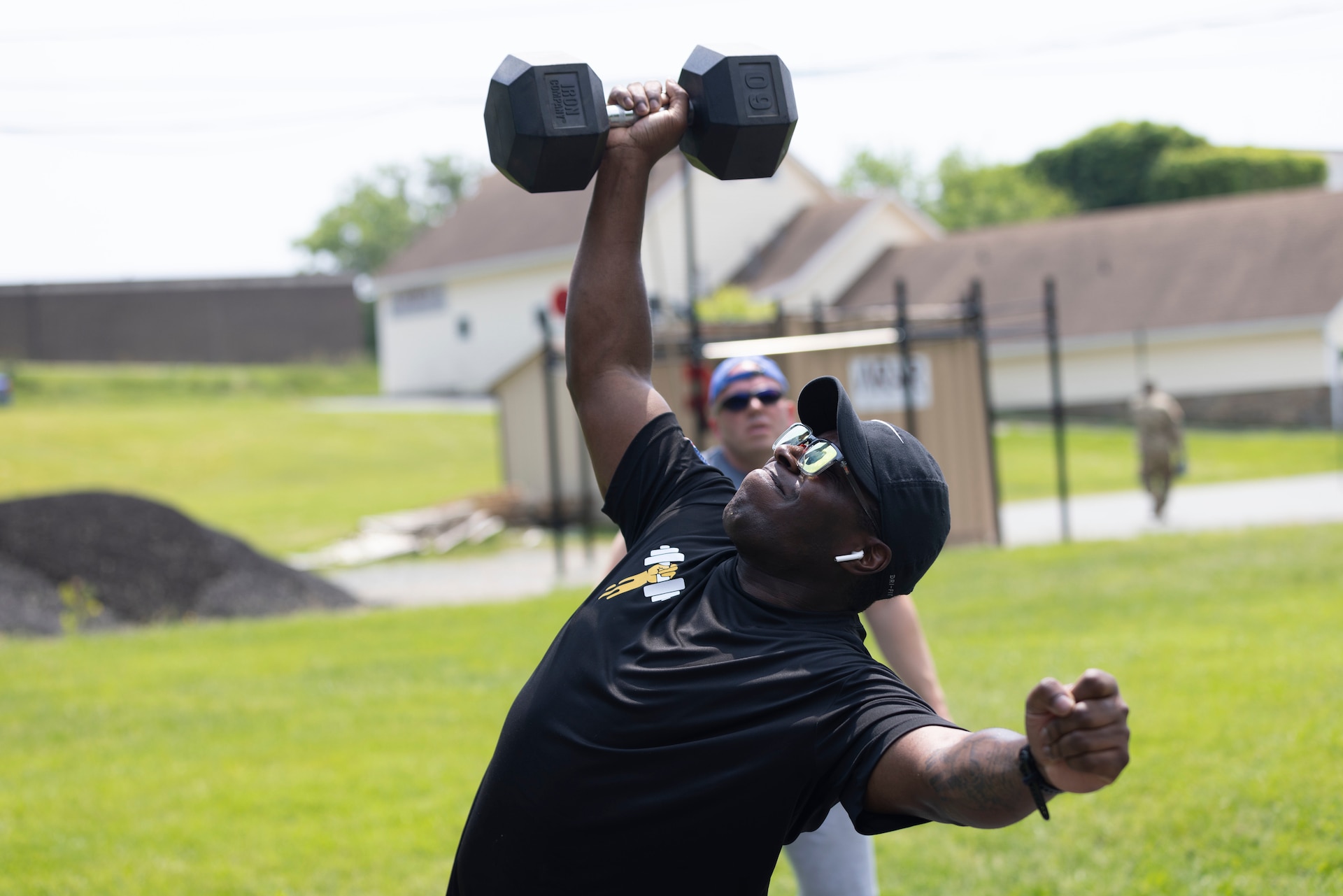 Soldier lifts weight during competition.